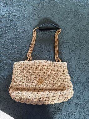 Tory Burch Kira Crochet Convertible Shoulder Bag in natural raffia.